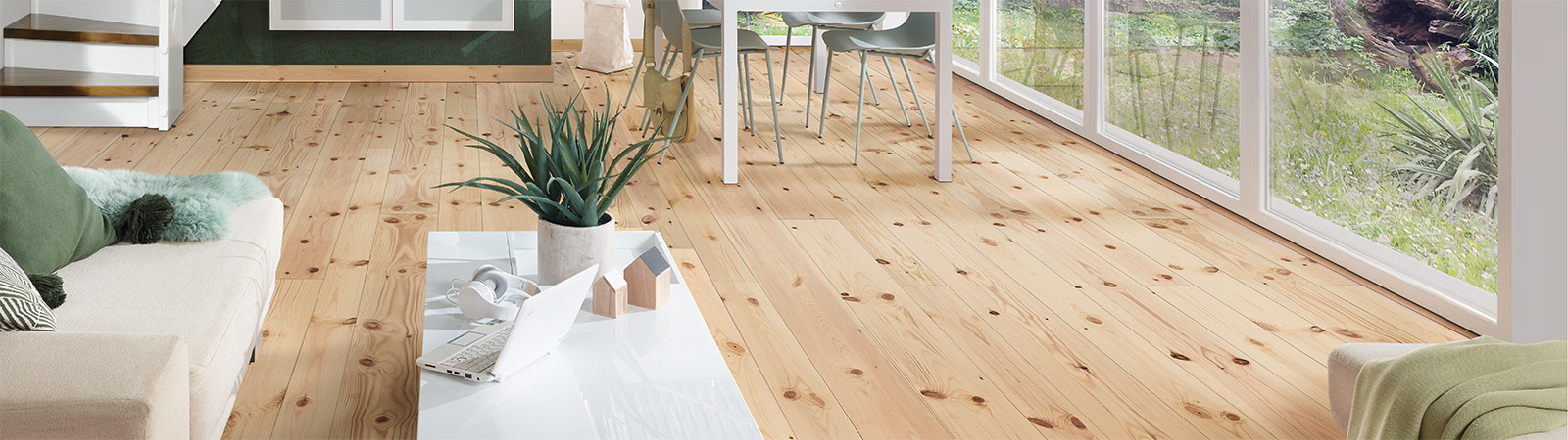 Osmo solid wood flooring in pine with a stain sheen adds warmth to your home.
