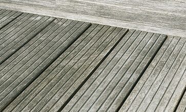 Oiling and cleaning makes timber decking look like new again
