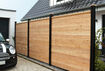 Osmo privacy screen Juel A in Larch next to a driveway