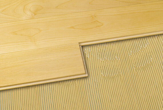 Osmo solid wood floorboards glued in with full-surface adhesion