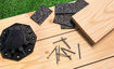 A selection of Osmo accessories for installing wooden decking: adjustable feet, screws and underlay pads
