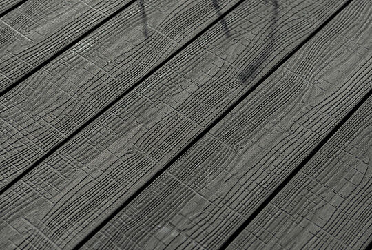 Close-up view of Osmo Multi-Deck solid profile boards in grey with a Vintage surface 