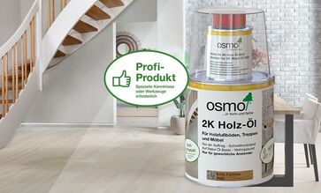 A selection of Osmo coatings, tools and accessories in front of wall panelling