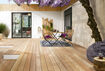 Osmo Bangkirai smooth timber deck decorated with various shades of purple 