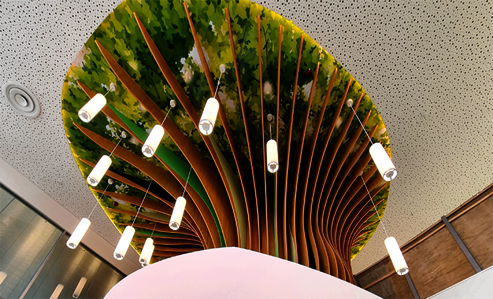 Playful handiwork in children’s hospital - a handmade tree made from wood for children’s eyes