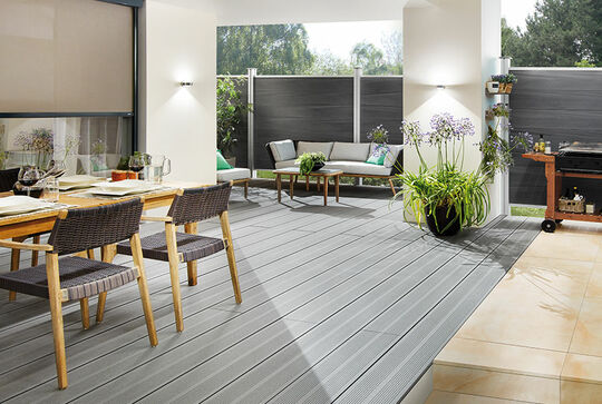 Osmo Multi-Deck BPC deck boards in light grey with French surface in a minimalistic garden 