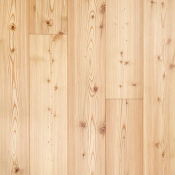 Osmo solid wood Lärche flooring with light bevels and tongue and groove connection